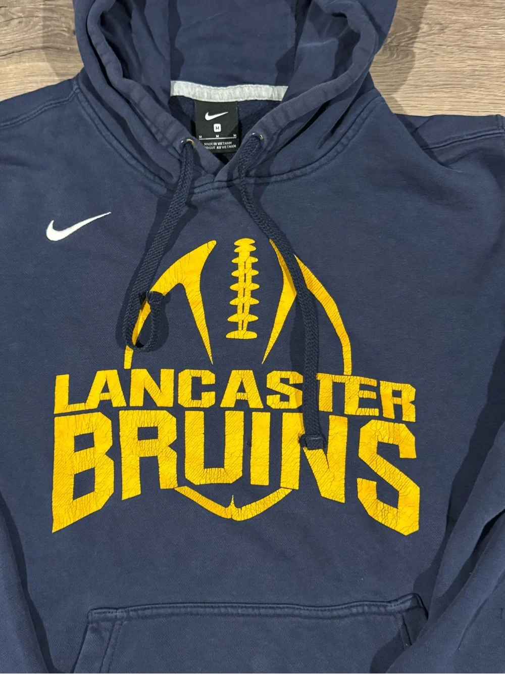 Nike Men’s Navy Hoodie with Yellow Lancaster Bruins Graphic